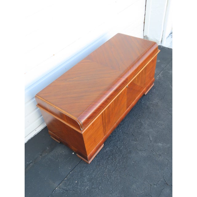 This brilliant Cedar Trunk Chest is made of wood, solid wood, walnut, veneer, and cedar wood. The Trunk made by Lane...