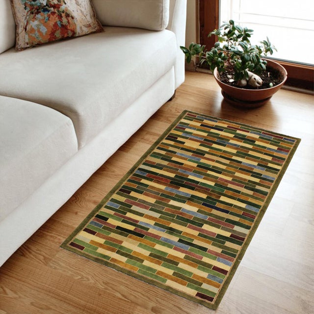 Transform your home's interior with a stunning hand-knotted Gabbeh rug. These rugs are meticulously crafted with bold...