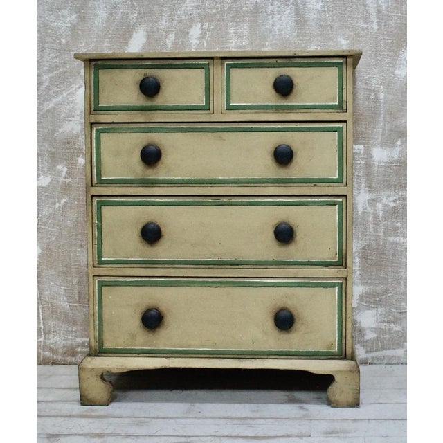 A Wonderful Victorian chest of drawers with original hand paint. Made from Pine, comprising of 2 over 3 pull out drawers...