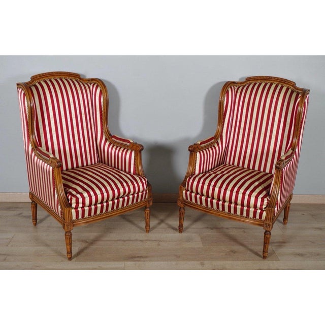 Early 20th Century Early 20th Century French Louis XVI Style Walnut Bergères à Oreilles with Fluted Legs - A Pair For Sale - Image 5 of 12