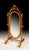Handcrafted in Italy, this full-length cheval mirror features a walnut frame with hand-carved details and gold leaf...
