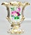 An oppulent Victorian vase, entirely and exquisitely hand enamel painted with bouquets of colourful flowers and genorously...