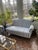 Comfy and spacious loveseat for a sunporch or kitchen. Fresh blue ticking, fade resistant upholstery. In excellent...