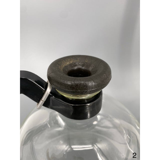 A coffee maker * Design by Wilhelm Wagenfeld and Gerhard Marcks * Manufacturer: Jenaer Glaswerk Schott & Gen * Material:...