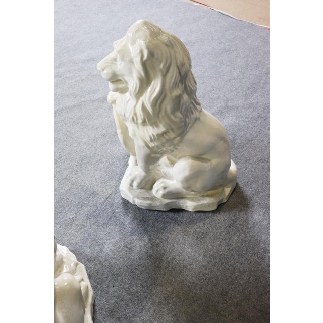 Pair Large White Glazed Ceramic Figures of Entryway Lions Paws Raised on Shield For Sale - Image 4 of 12