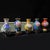 Chinese Set of 5 Miniature Chinese Cloisonné Vases | Floral Motif With Wood Stands & Box For Sale - Image 3 of 15