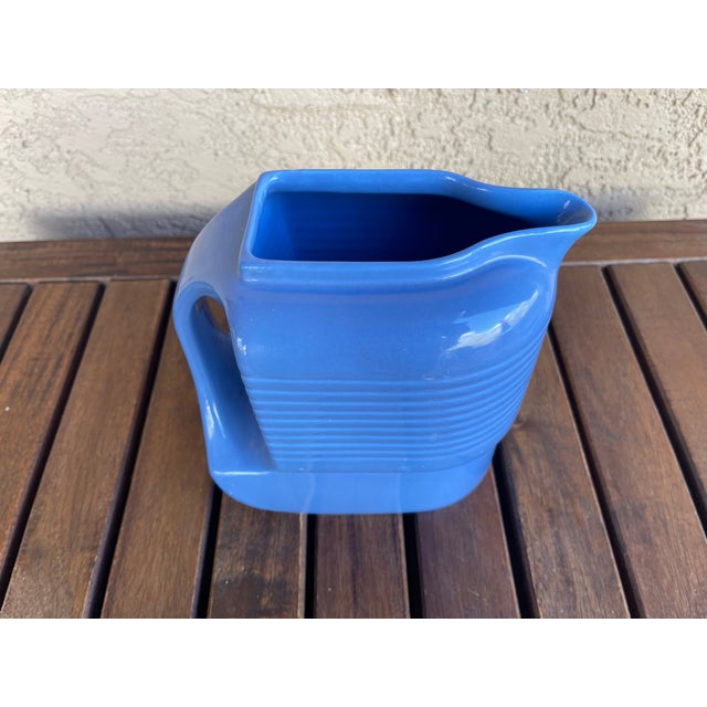 Here is one of my many Periwinkle Blue Westinghouse Refrigerator Ware ceramic Pitchers made by Hall China Company in the...