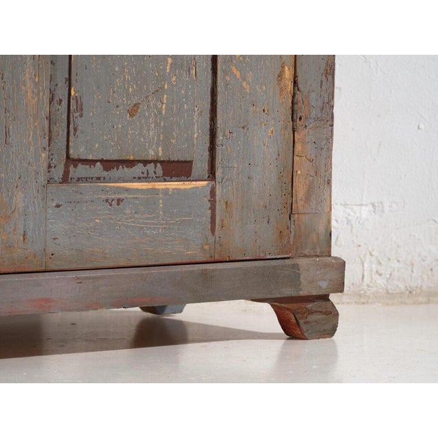 Antique rustic wardrobe made of solid pine wood, originating from central europe and dating to the early 20th century,...