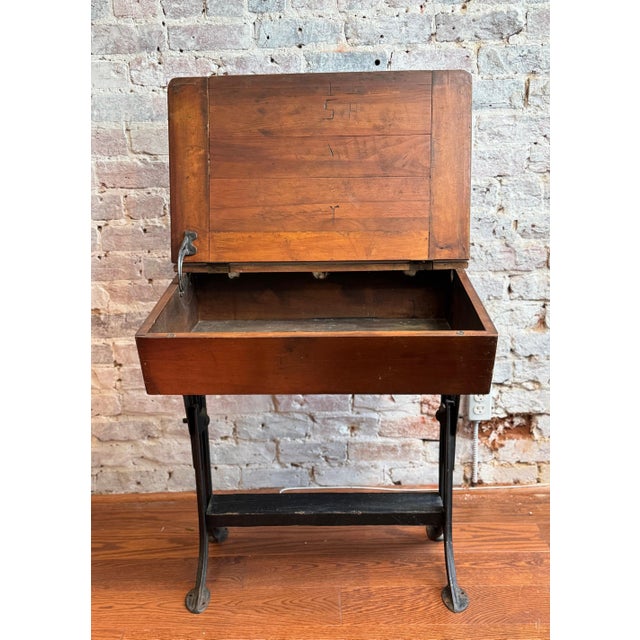 Add a unique piece of education history to your home with this Antique School Desk. This piece is perfect for both storage...