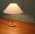 Hand Carved Table Lamp A very pretty piece, the lamp has a turned wooden candlestick base, the lamp is beautifully hand...