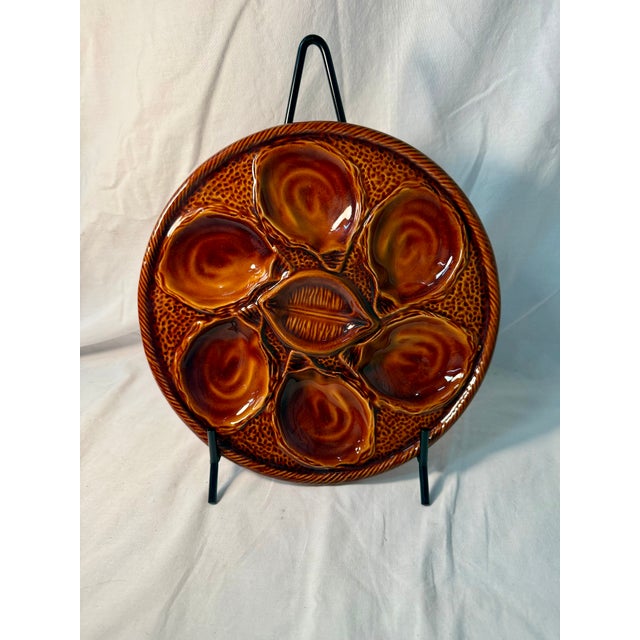 Saint Clement is a renowned French faience manufacturer dating back to the 18th century. This stunning oyster plate...