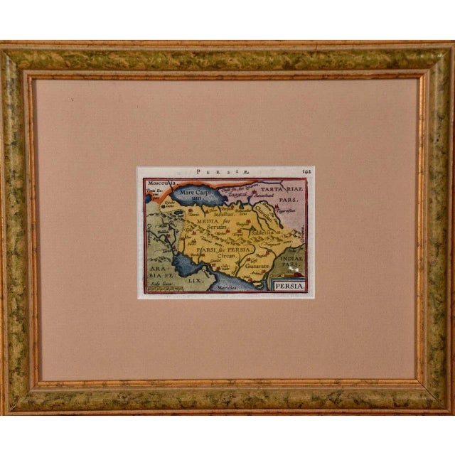 This is a 16th century hand-colored map entitled "Persia" by Gerard Mercator and Henricus Hondius, published in Amsterdam...
