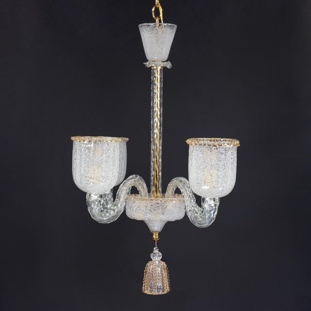 This 1940s Italian chandelier, attributed to the legendary Venetian glasshouse Barovier & Toso, perfectly captures the...