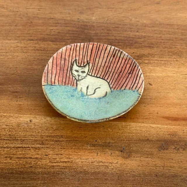 Tiny handcrafted folk art pottery cat dish. A charming diminutive touch. No marker's mark. *Please see dimensions noted....
