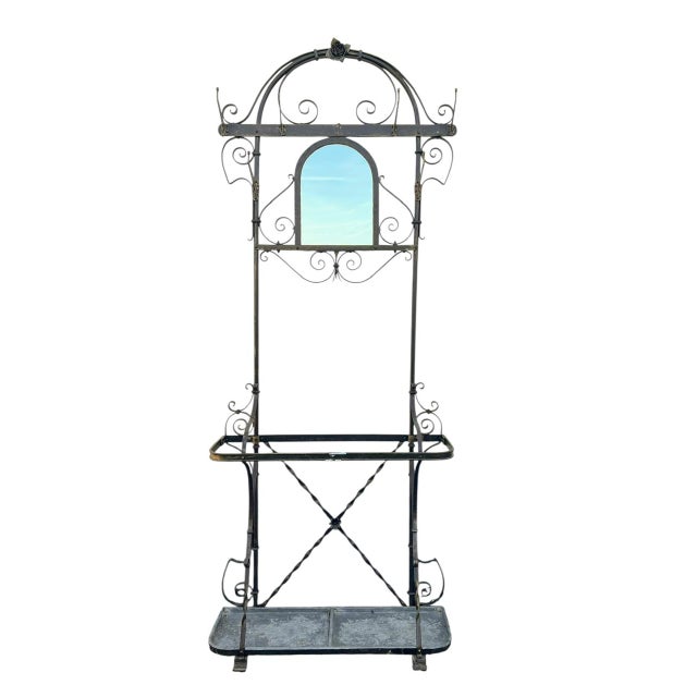 An ornate antique standing coat rack in Art Nouveau style, around 1900. It is handforged and completely riveted from...