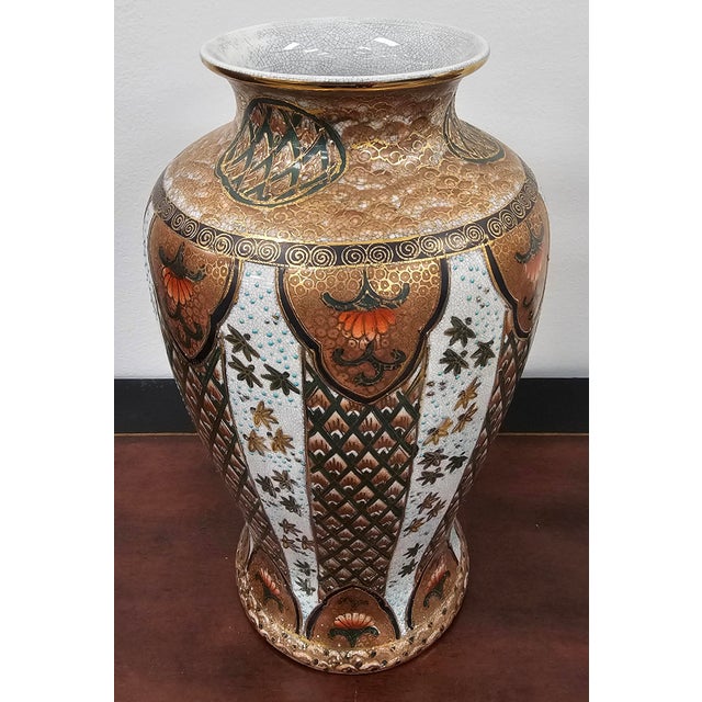 A 19th Century Meiji Japanese Satsuna Enanel Porcelain Vase. Measures 7" in width, 7" in depth and 12.25" in height.