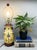 Charming vintage Chinese porcelain table lamp with a vibrant yellow background, hand-painted scrolling foliage, and...