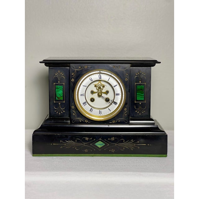 Horlogerie Paris French Belgian black slate visible escapement mantle clock with malachite inlay, circa 1880. An exquisite...