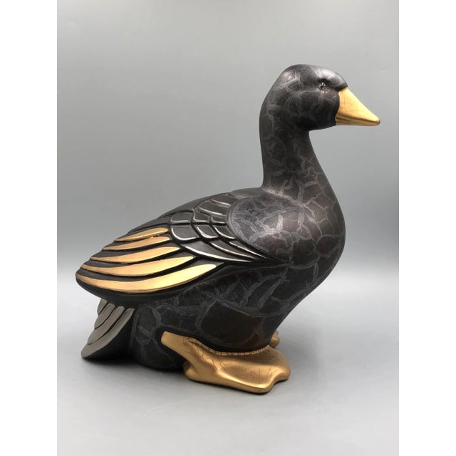 This charming porcelain goose, handcrafted by Lastra, Portugal, is a true work of art. The masterful design and detailed...