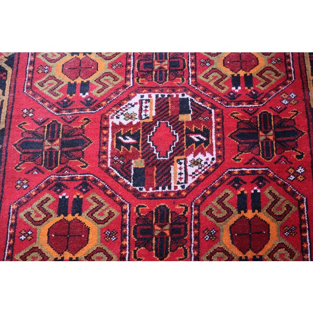 This is an Afghan Handmade tribal Bukhara Pattern rug. This Afghani Vintage Rug was hand-knotted by Afghani Women in the...