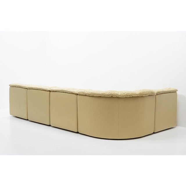 De Sede five-piece modular sofa DS-11 in beautiful crème colored leather: The leather is a patchwork design made from...