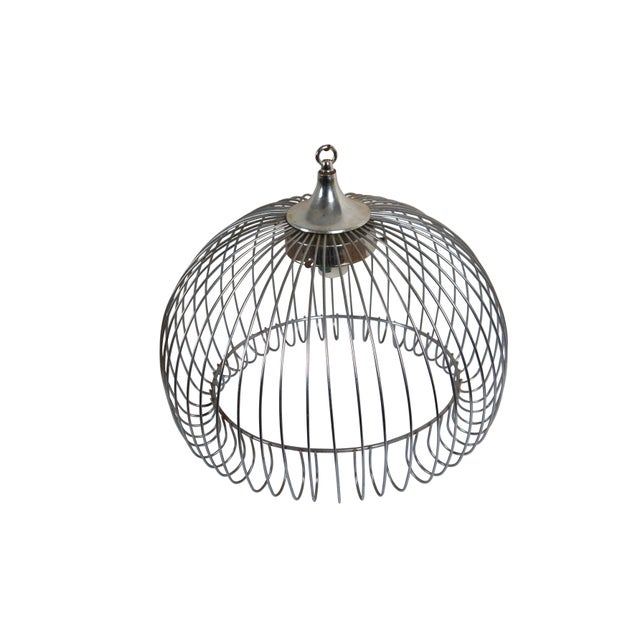 Mid 20th century chrome bird cage style swag / pendant light. Round cage form with curled in lower edge. Missing globe...