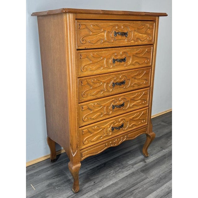 This beautifully styled Vintage French Louis chest of drawers offers a refined and graceful look, featuring ornate carved...