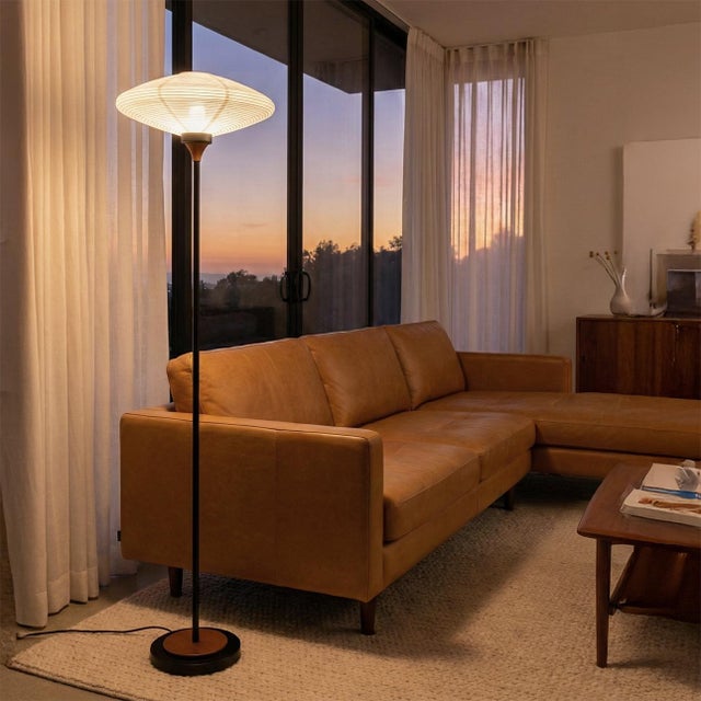 The Roswell Torchiere Floor Lamp by NOVA of California is a refined blend of classic materials and modern form. Featuring...