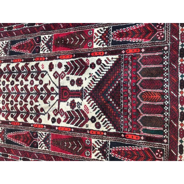 Baluch Afghan rug mid-20th century with a prayer design and nice colors, entirely hand knotted with wool velvet on cotton...