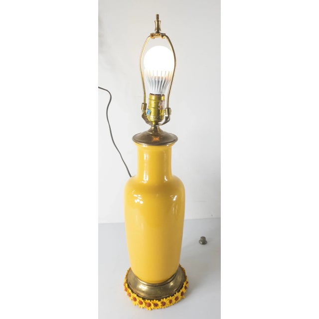 We are selling this early 20th century decorative lamp by Bretby. This lamp has yellow crackle glaze and Chinoiserie...