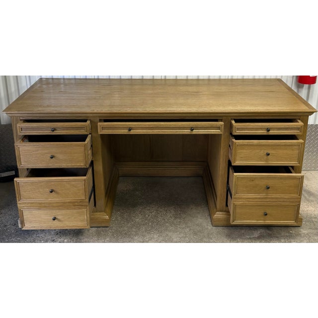 With its stately scale and stripped-down look, this handsome desk is a perfect addition to your office. Doors and sides...