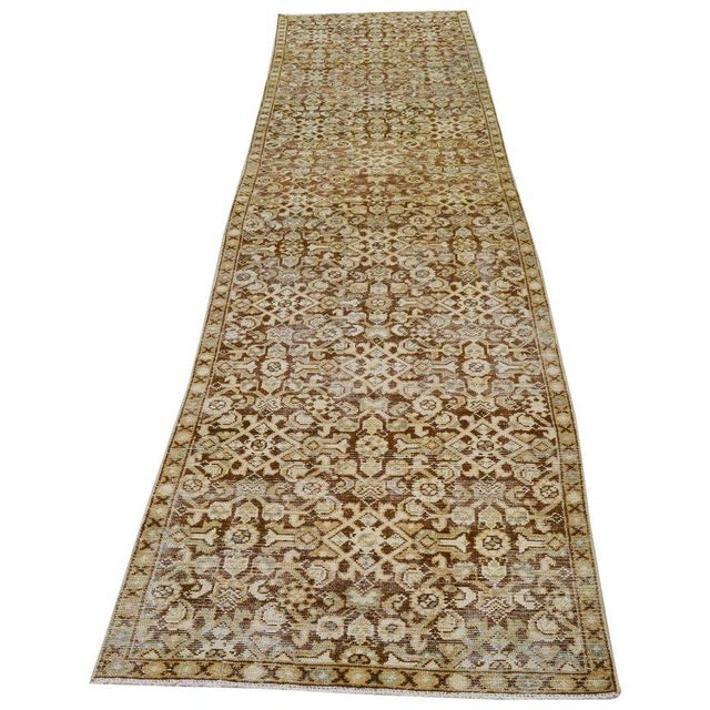 Hand-knotted with care using traditional rug-making techniques, this wool rug blends timeless craftsmanship with a modern...