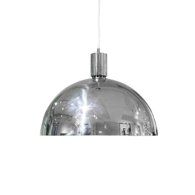 French "Space Age" ceiling lamp, made of chromed steel with white, lacquered interior part with a one-point light source....