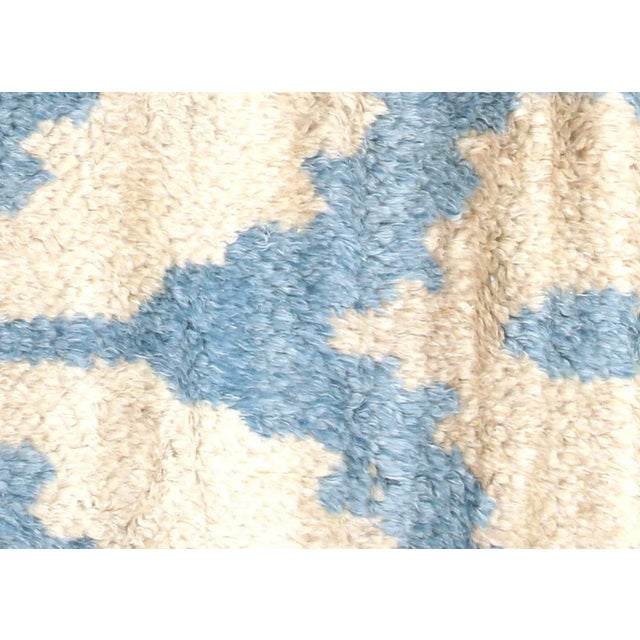 Contemporary Egyptian Tulu Rug. Hand woven in an Ikat design with wool on cotton foundation in the Nile delta region of...