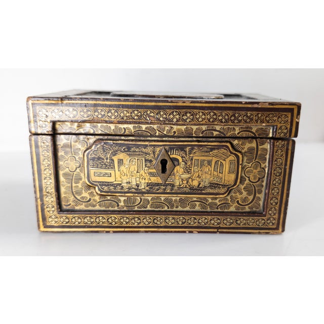 We are selling this nice 19th century Chinese export tea caddy with gilt decoration. This box has nice form and has the...