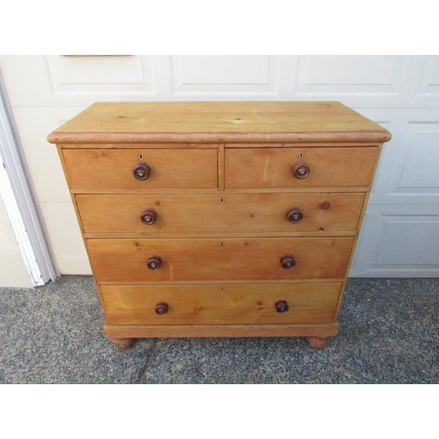 Antique Scottish pine chest of drawers, c.1850 Having a molded rectangular top, below which are two short and three long...