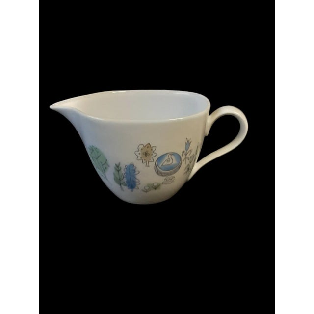 Adorable Creamer and Sugar Bowl with lid . Designed by Elsa Fischer-Treyden for Rosentahl German China. the designe is...