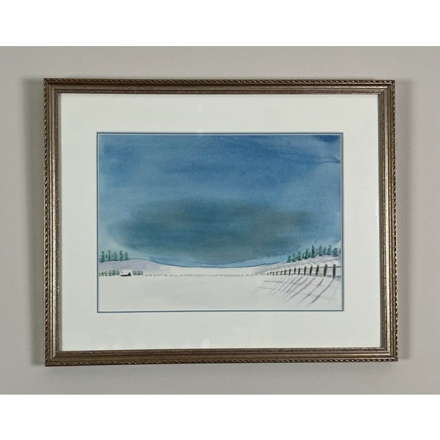 Watercolor of serene snow landscape. Beautifully shaded sky. Professionally framed in narrow, silvery frame with double...