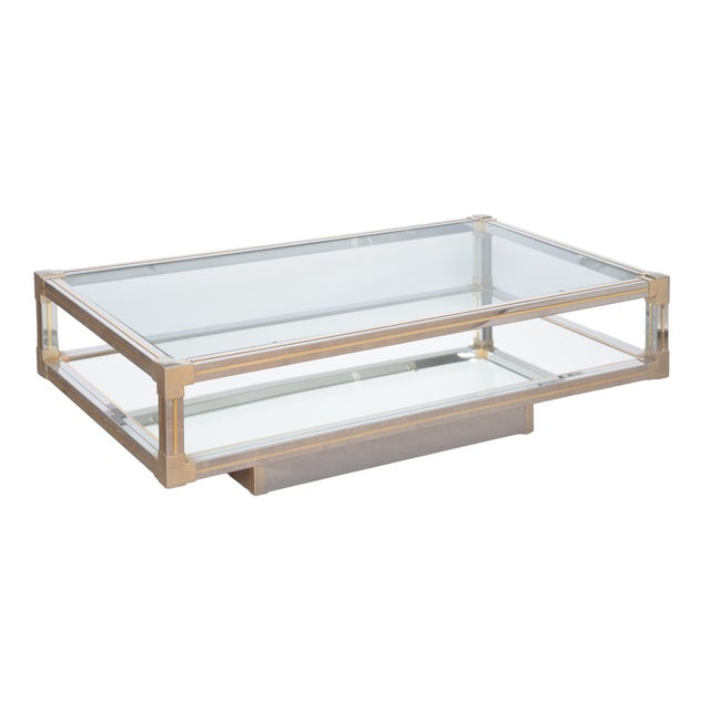A fine Italian rectangular low or coffee or cocktail table - attributed to the celebrated designer, Romeo Rega - featuring...