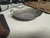 Shop a vintage decorative oval metal dish with dual handles, intricate embossed detailing, and antique silver finish at...
