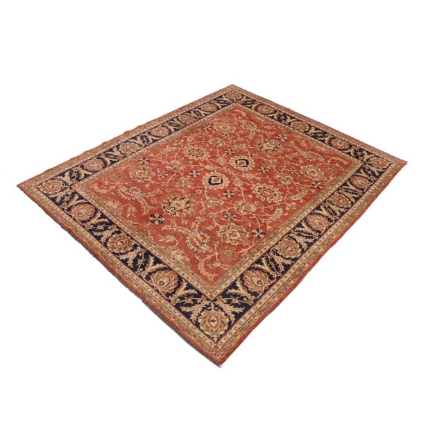 "Enhance the ambiance of your home with this magnificent Persian-influenced Turkish hand-knotted rug made by skilled...