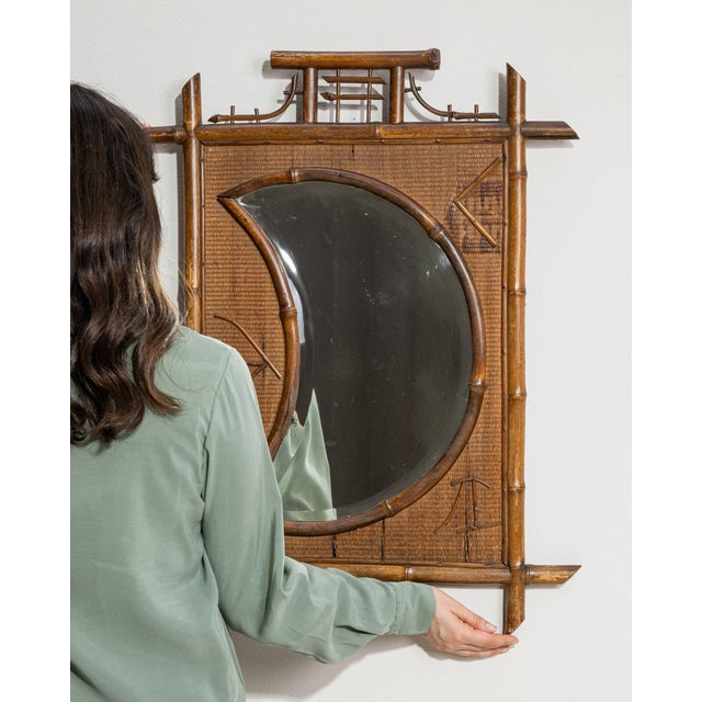 A mirror whose faux bamboo, natural brown wood with cane gives it real character at first glance. Originating in France...