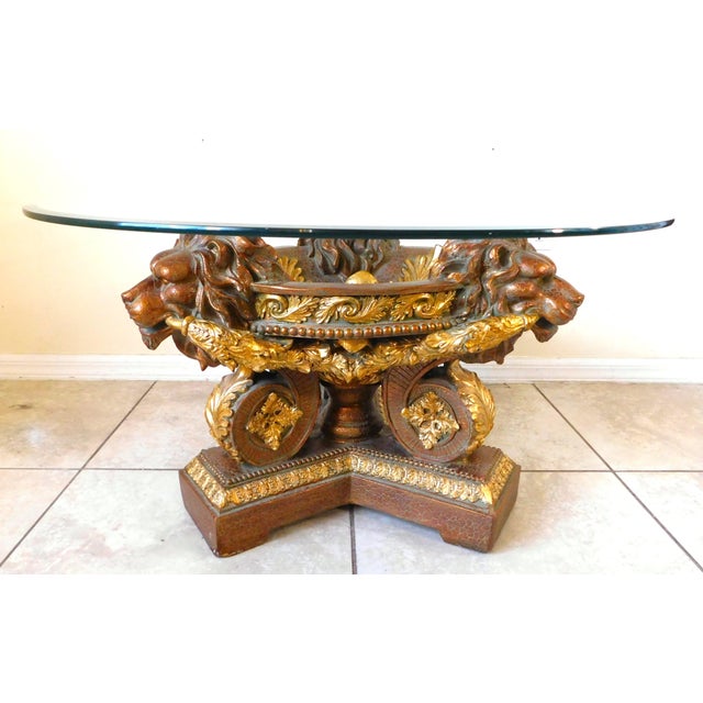 Fabulous vintage ornate gold sculptural lion head beveled glass top table. Absolutely Stunning! Circa 1970s/1980s. Thick...