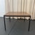 This iconic Mid-Century Modern coffee table is designed by Florence Knoll for Knoll International. It embodies the...