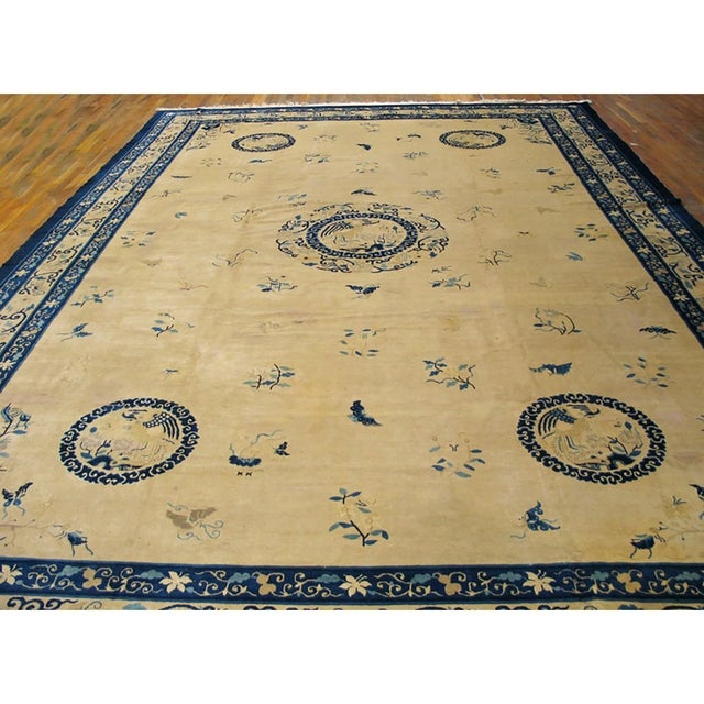 Antique Chinese Peking rug. Size: 11'8" x 17'3". Antique Chinese – Peking Large Wool Ivory Rug, Circa Date: 1890s. This...