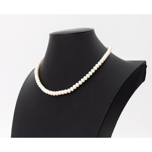 Freshwater Pearl 18K Yellow Gold Sapphire Diamond Necklace, featuring fully frilled button cultured pearls strung on silk...