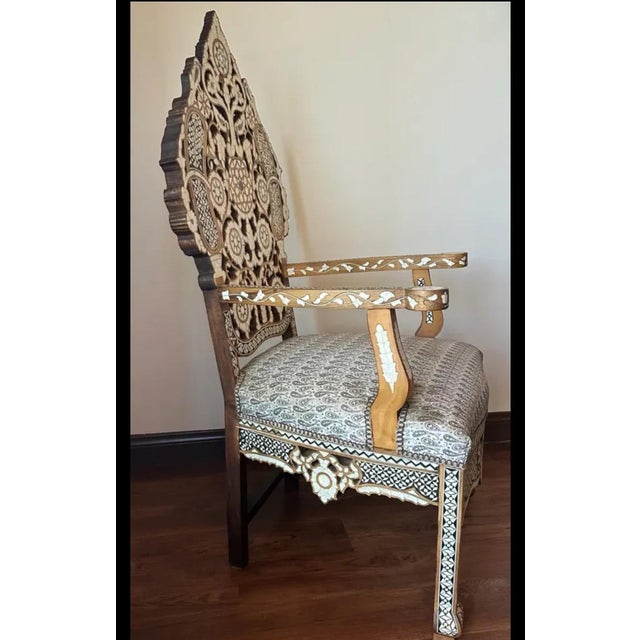 A stunning handcrafted Syrian-style armchair featuring extraordinary hand-cut mother-of-pearl and abalone shell inlay...