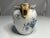 Antique Floral Blue Transferware Porcelain Pitcher for your consideration. The pitcher measures approx. 5 3/8 inches tall...