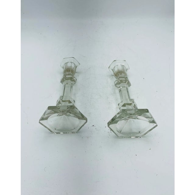 Lovely pair of Vintage Glass Candlesticks. The 7.25 inch tall candle holders are 3.5 inches wide at the base and 2 inches...