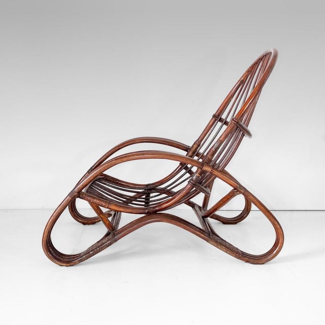 Mid Century Modern Bamboo Armchair in the style of Tito Agnoli, Italy 1960s Stylish Bamboo Armchair, crafted in Italy...